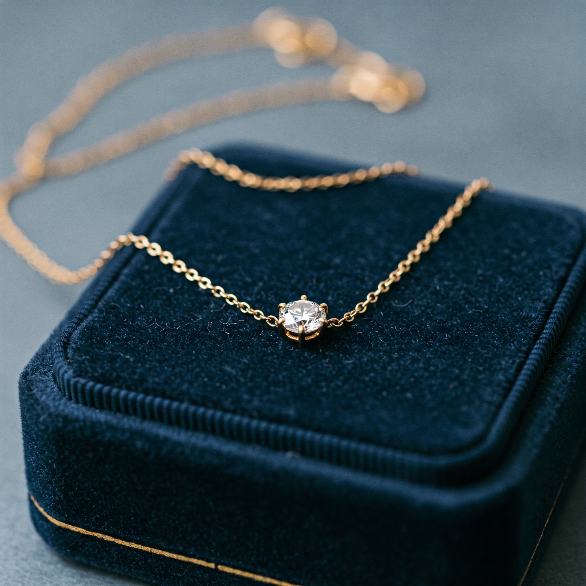 Stunning gold pendant necklace with a brilliant diamond centerpiece for a timeless look.